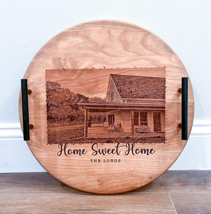 Custom round cherry closing-gift tray with black handles and engraved home portrait