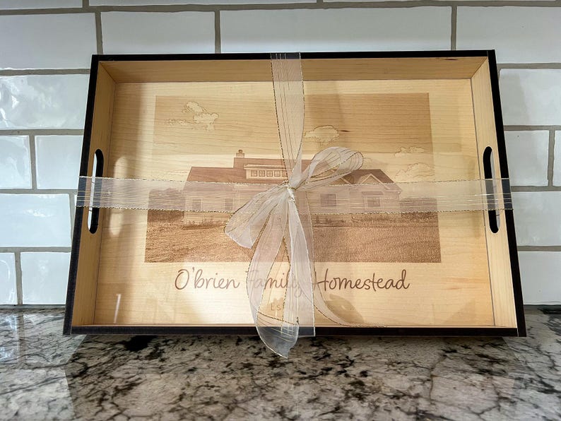 Personalized engraved ottoman tray tied with a ribbon and ready for gifting